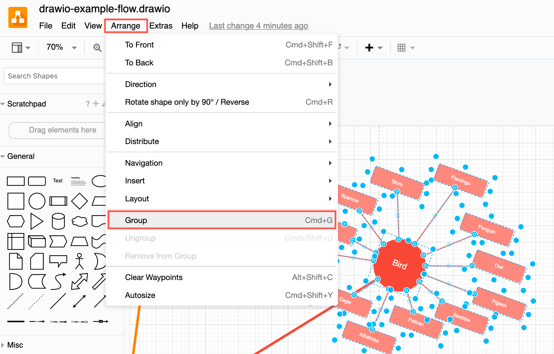 Group selected shapes and connectors via Arrange > Group in the menu